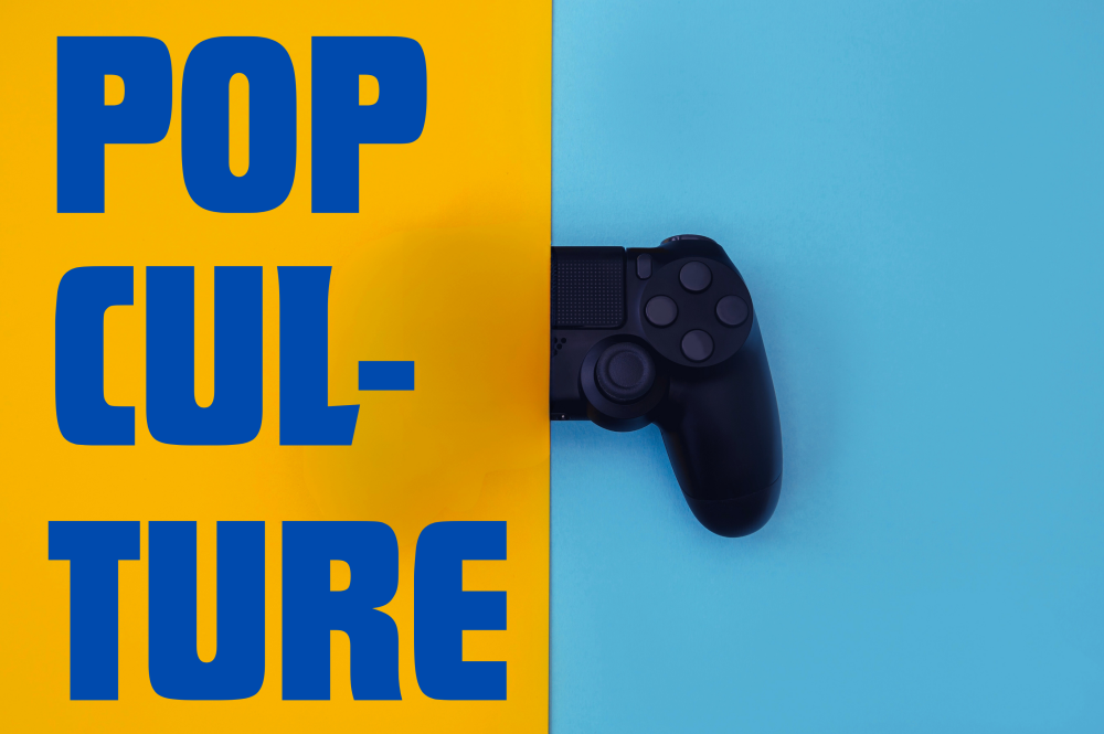 A blue and orange background with half of a video game controller and the text