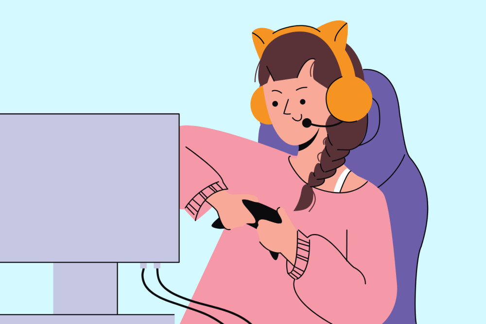 cartoon female with orange cat headphones and pink jumper playing video games on a PC