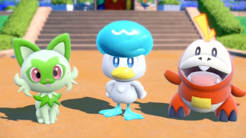 From left to right is Sprigatito, Quaxly, and Fuecoco